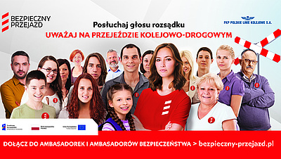 Kilkanaście osób różnej płci, za nimi krzyż św. Andrzeja i logotypy kampanii oraz PKP Polskie Linie Kolejowe.